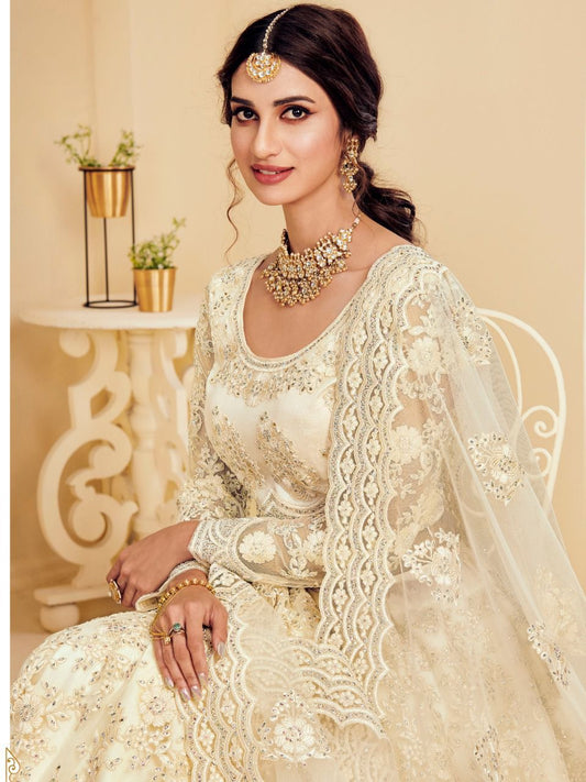 Ethereal Off-White Soft Net Party Wear Lehenga with Heavy Stone & Coding Work