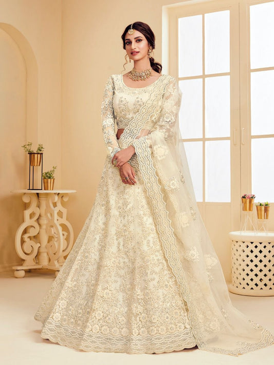 Ethereal Off-White Soft Net Party Wear Lehenga with Heavy Stone & Coding Work