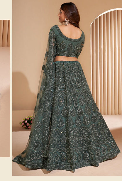 Premium Deep Green Soft Net Party Wear Lehenga with Heavy Embroidery & Stone Work